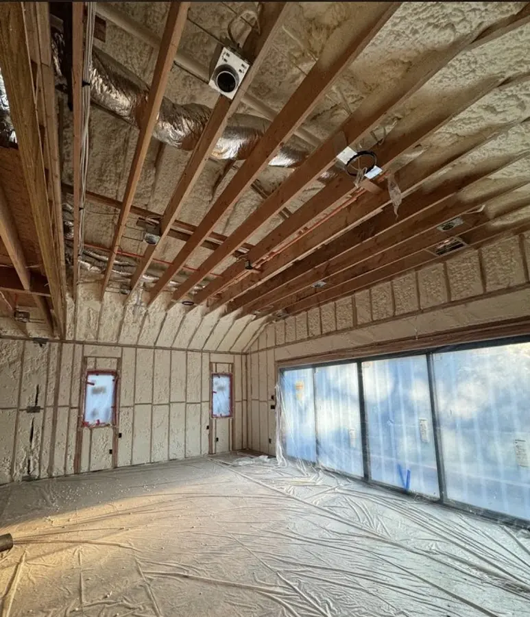 Interior walls and ceiling insulated with spray foam during new construction in Covina